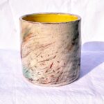 Hand built pot in natural colours with abstract marks